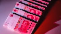 China Maintains Grip on Yuan With Fix Stronger Than 7.2 Level