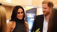 Yes they Can! Meghan and Prince Harry are all smiles as they rub shoulders with Team Canada's competitors at Invictus Games event