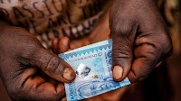 World’s Worst Currency Faces Pain as Tanzanian Imports Boom