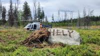 Man rescued from wilderness after scrawling ‘HELP’ into rock with mud