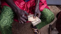 Nigeria Naira Gains as Currency Reserves Jump to Three-Year High