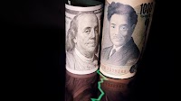Dollar strengthens as market digests Fed's hawkish cut
