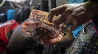 Ghana’s Battered Cedi Currency May Finally Be Getting a Breather