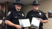 Photo: Police Chief J.W. Howell names Officer C.C. Butler Police Officer of the Year