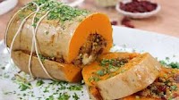 Roasted butternut squash with mushroom, cranberry and nut stuffing