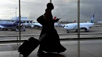 $25 for a glass of wine: Why you may want to rethink overseas plans