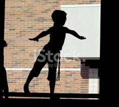 young gymnast on balance beam stock