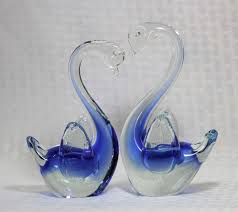 A Pair Of Hand Blown Glass Swans With