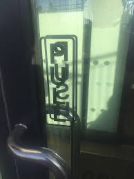 Push Pull Sign On A Glass Door Signs