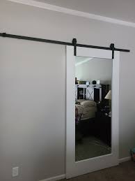 White Primed Mirror Sliding Barn Door