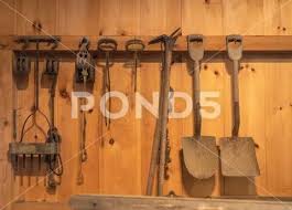 Farm Tools And Shovels Hung