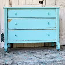 An Antique Dresser With Latex Paint