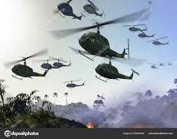 huey military helicopters flying jungle
