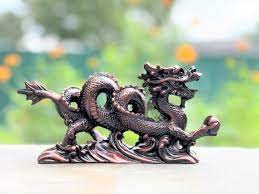Chinese Dragon Holding Pearl Statue