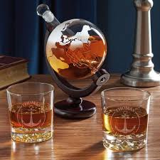 Globe Decanter With Engraved Rocks