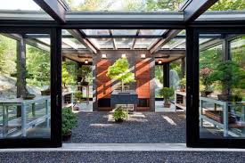 Glass House In The Garden Modern