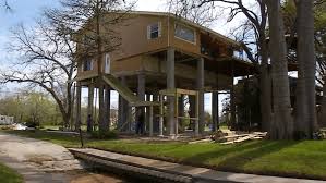 Raises Houses Out Of Flood Plain On Stilts