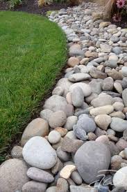 Rock Border Along Fence Line Lawn