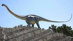 Dinosaur Statue In The Entrance Of