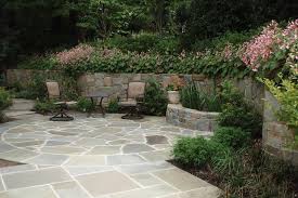 Stone Patio With Retaining Wall And