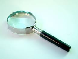 Silver And Black Magnifying Glass On