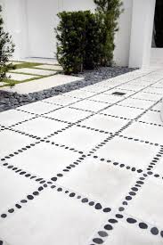 Concrete Pavers With Black River Rocks