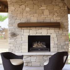 Stone Fireplace And Driftwood Mantel