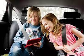 Children Undo Seatbelts In Car