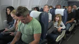 Child On Plane Is Kicking The Seat Of