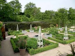 Garden With Planters And Obelisks