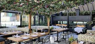 A Renovated Rooftop Patio With Gardens