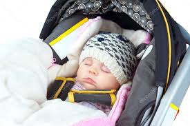 Newborn Sleeping In Car Seat Stock