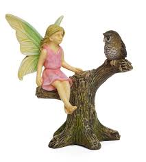 Miniature Fairy Girl In A Tree Branch