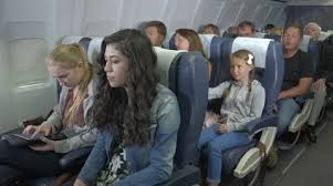 Child On Plane Is Kicking The Seat Of
