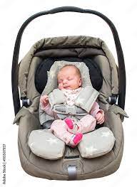 Newborn Baby Girl In A Car Seat Stock