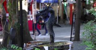 Statue Of Dragon At Purification Fount