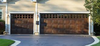 Wood Garage Doors Vs Steel Garage Doors