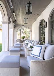 Light Gray Wicker Chairs And Ottomans