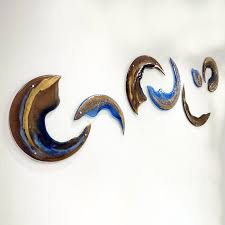 7 Component Wall Sculpture In Bronze