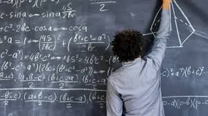 Man Writing Calculus Formulas On