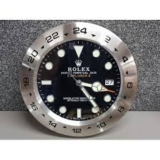 A Rolex Explorer Ii Style Wall Clock