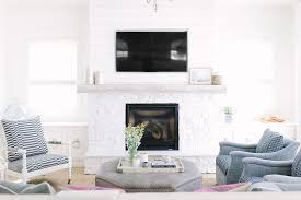 White Shiplap Fireplace Wall With White