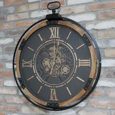 A Metal Wood Frame Working Cog Wall Clock