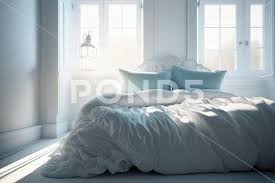Cozy White Bed In Light Blue Bedroom