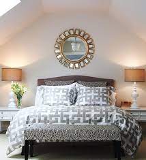 Wall Decor Above Curved Headboard Ideas