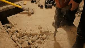 Jack Hammer Breaking Up Concrete
