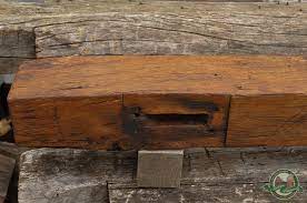 reclaimed barn beam mantel with cool