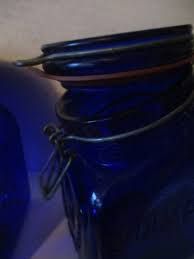 Slant Front Cobalt Blue Glass Jars With