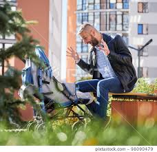 Father Entertaining Little Son In