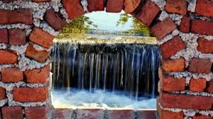 Brick Wall And Waterfall Stock